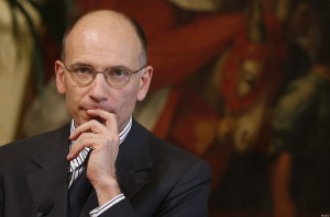 Italy's Prime Minister Letta listens to a reporter's questions during a joint news conference with Gurria, secretary-general of the Organisation for Economic Co-operation and Development (OECD)  at Chigi Palace in Rome