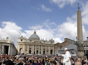 Pope Francis waves to faithful as he is driven through the crowd with his popemobile in St. Peter's Square prior to the start of his weekly general audience at the Vatican, Wednesday, April 10, 2013. (AP Photo/Gregorio Borgia)